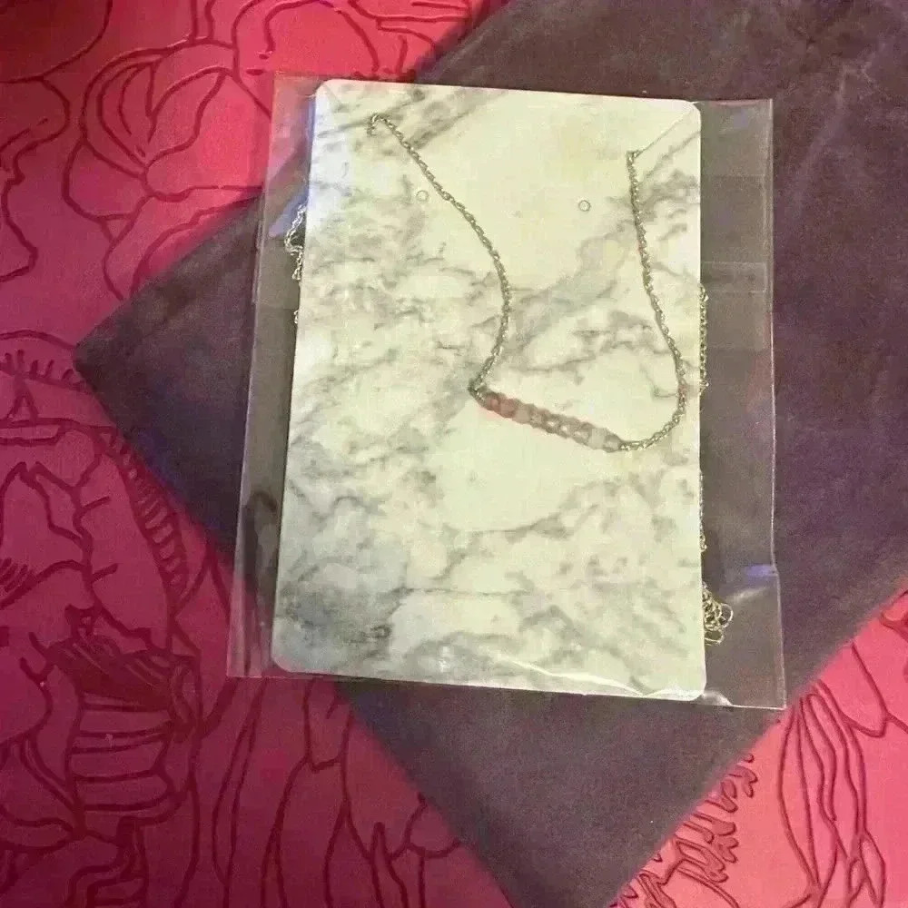 Pink gem stone necklace with gold chain